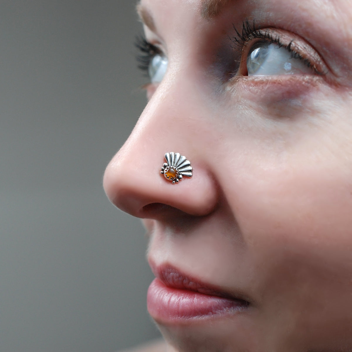 large amber nose stud unique