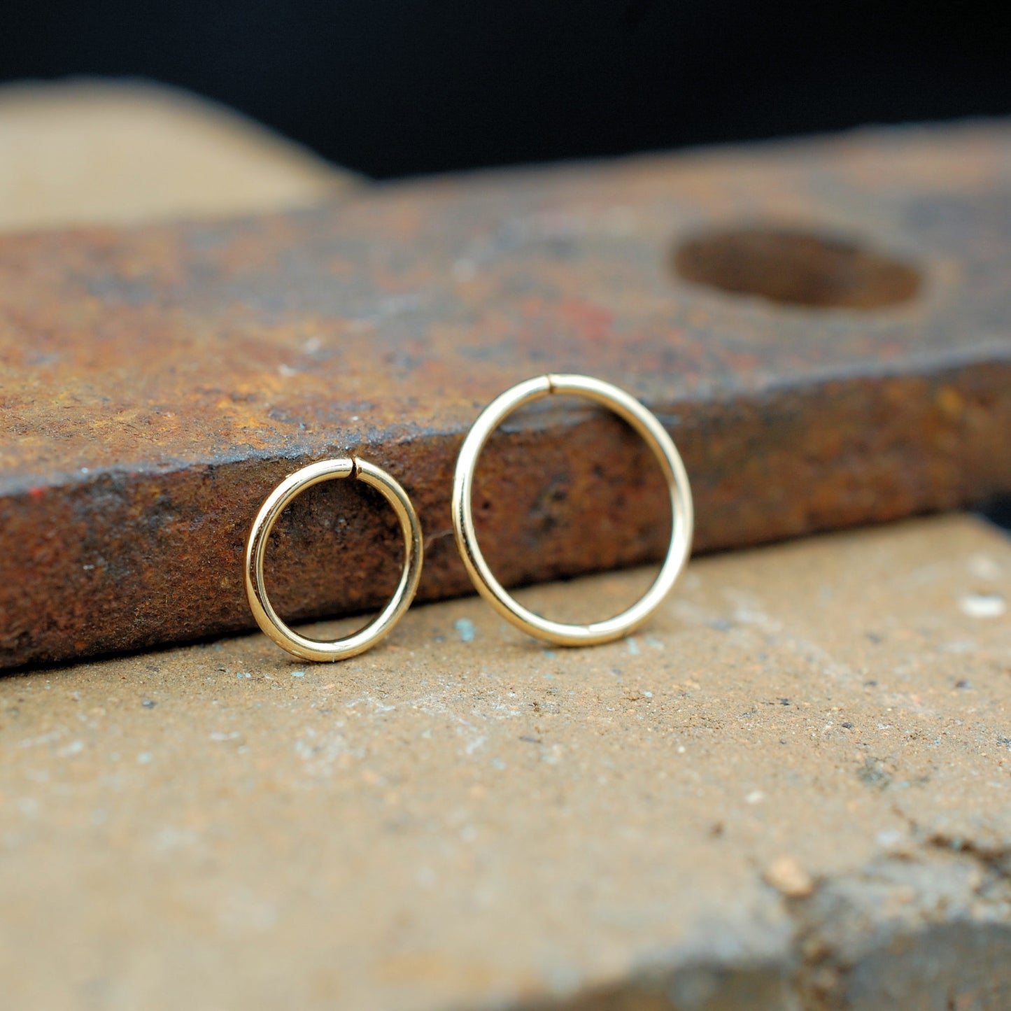 set of two yellow gold nose rings