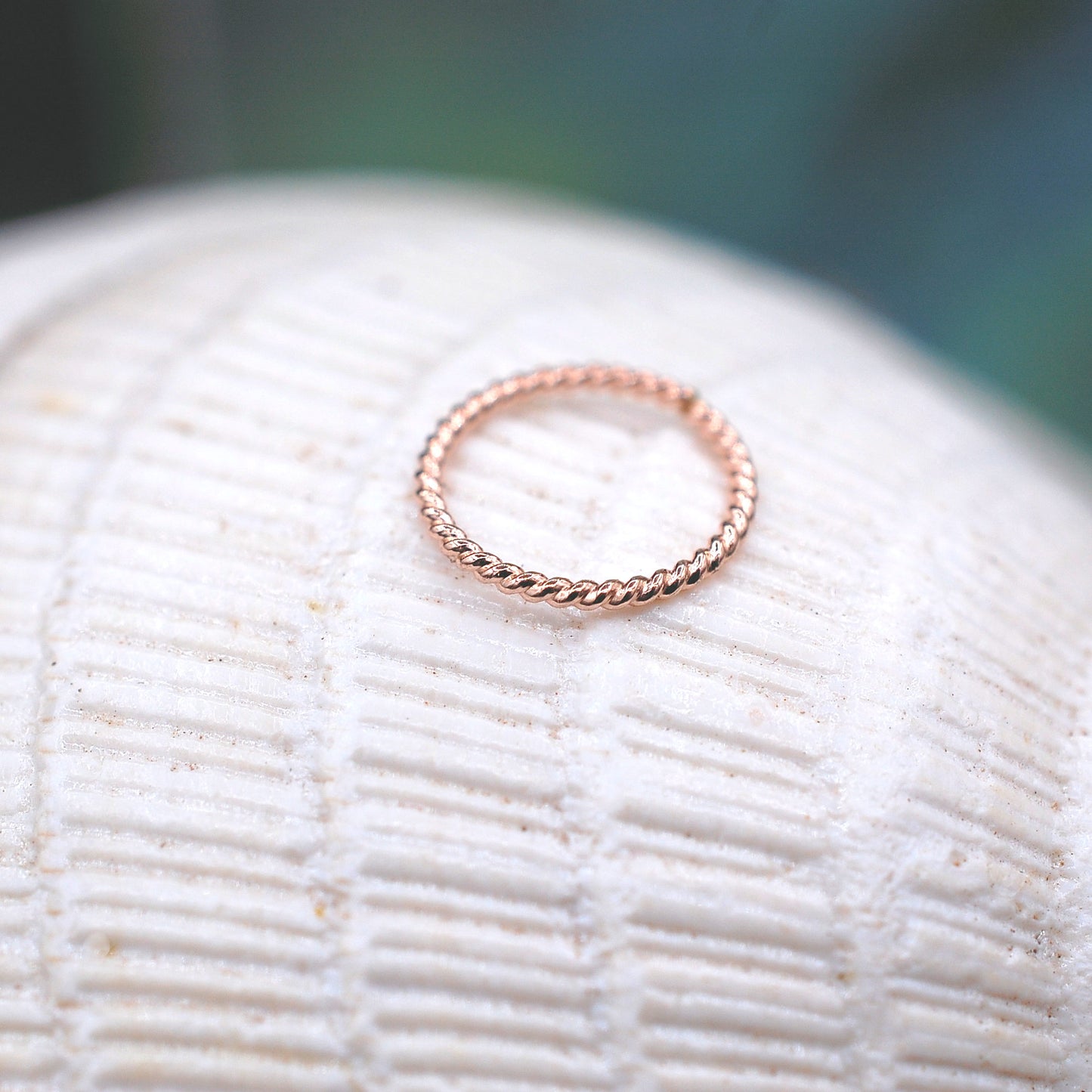 nose ring made with twisted rose gold wire