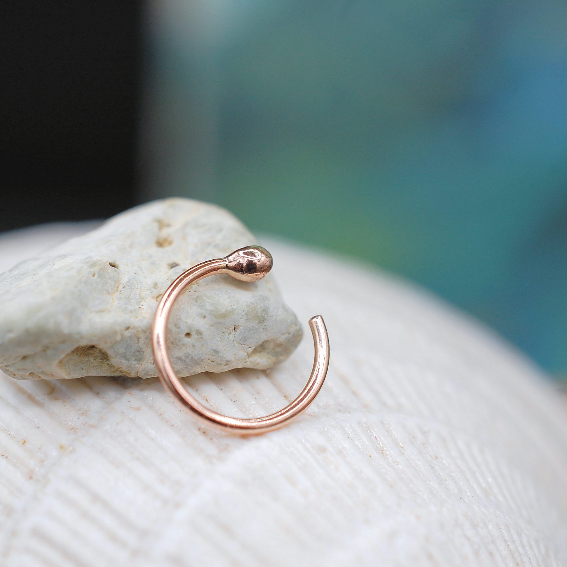 14 karat rose gold nose ring open style
