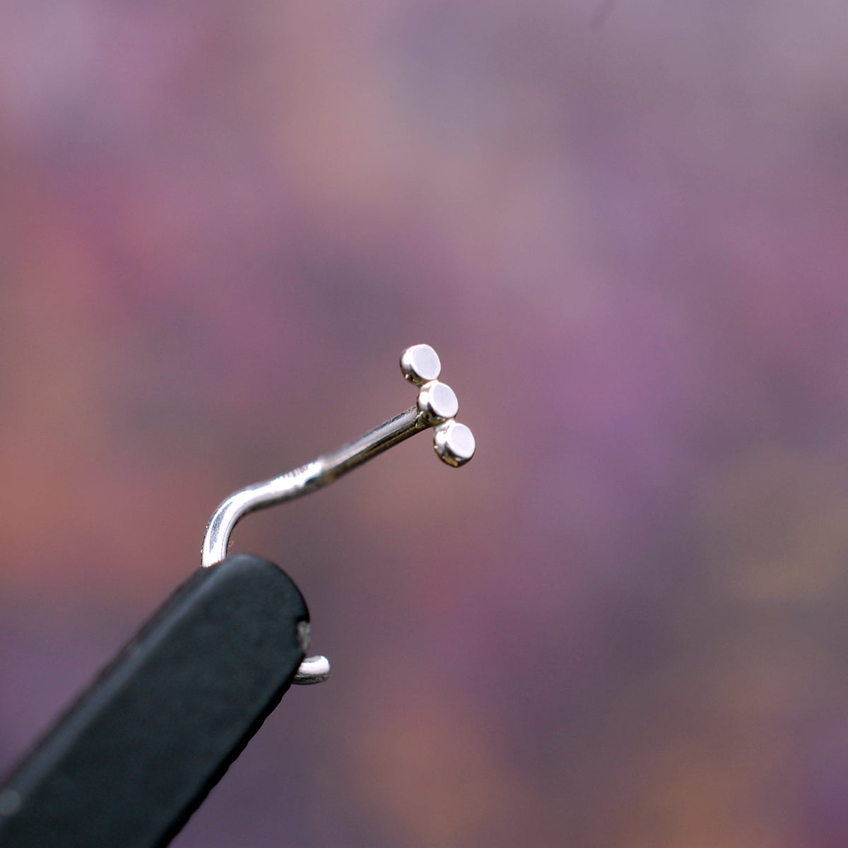 small silver nose ring