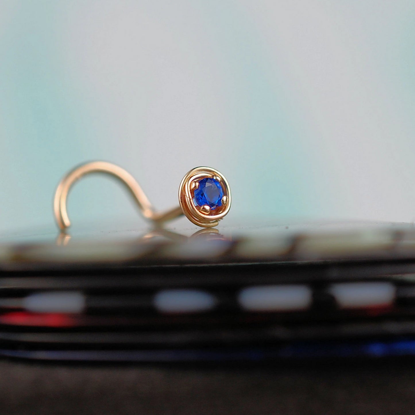 dainty sapphire nose jewelry in 14 karat yellow gold
