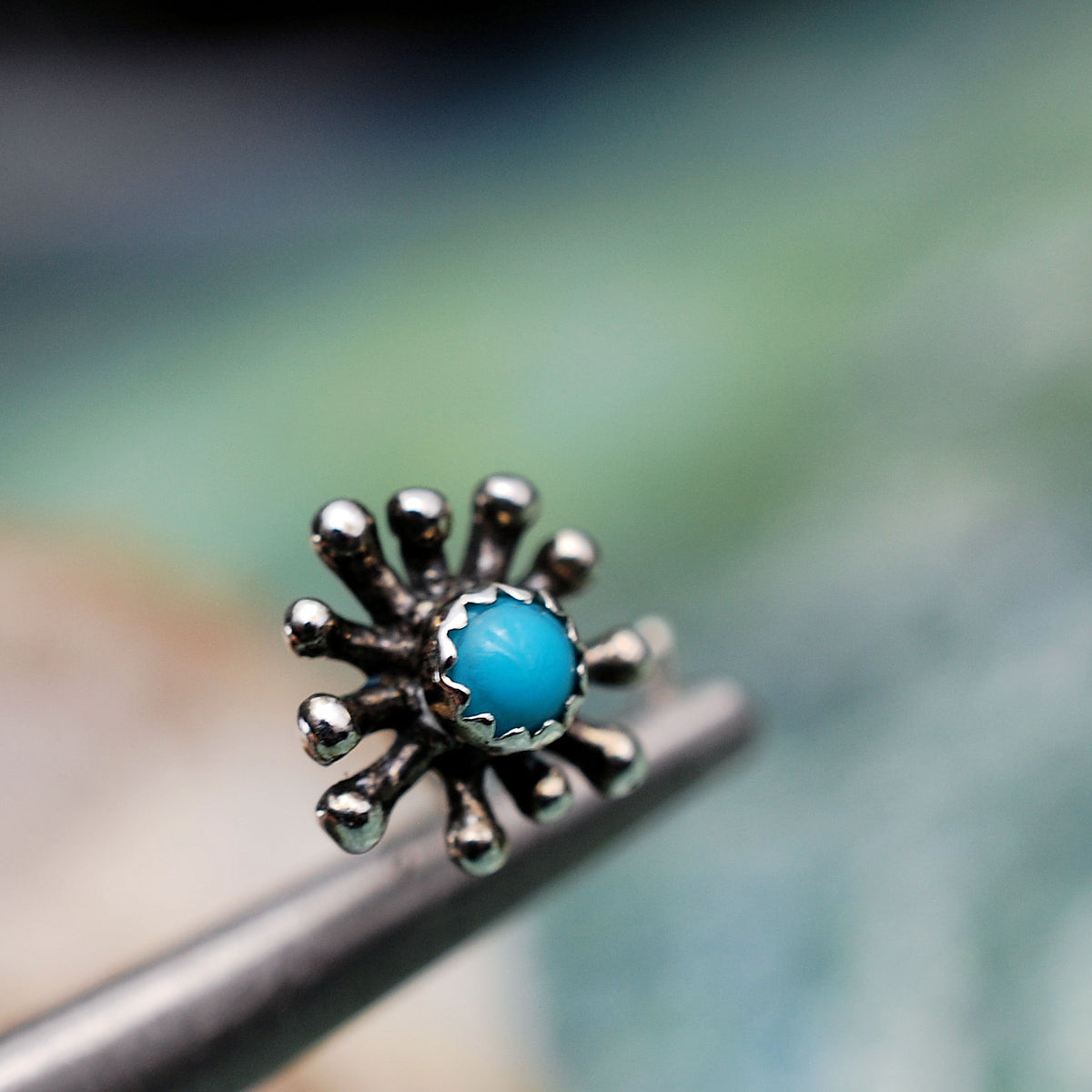 big silver nose jewelry