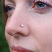 dainty gemstone nose stud in yellow gold