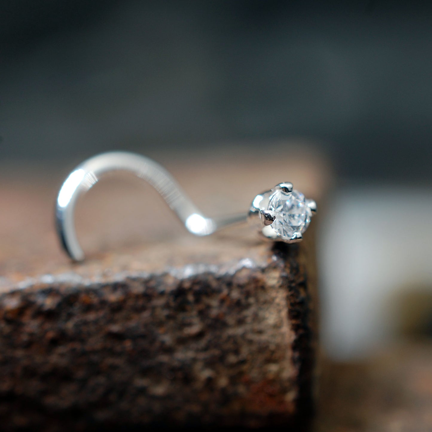 silver and diamond nose bone