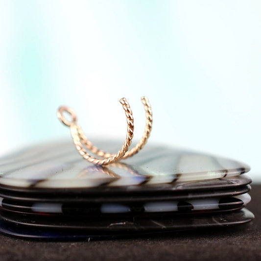 unique 14 karat yellow gold nose ring