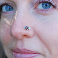 sterling silver nose stud with tiny garnet
