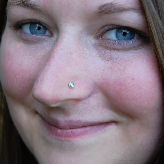 rainbow moonstone gemstone in 14 karat yellow gold nose jewelry