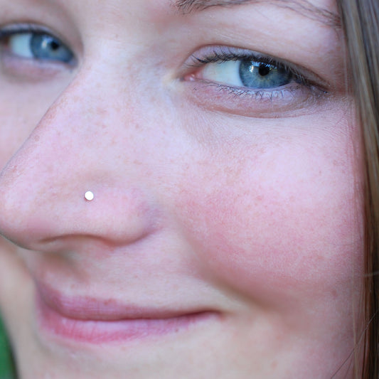 flat yellow gold spot nose stud