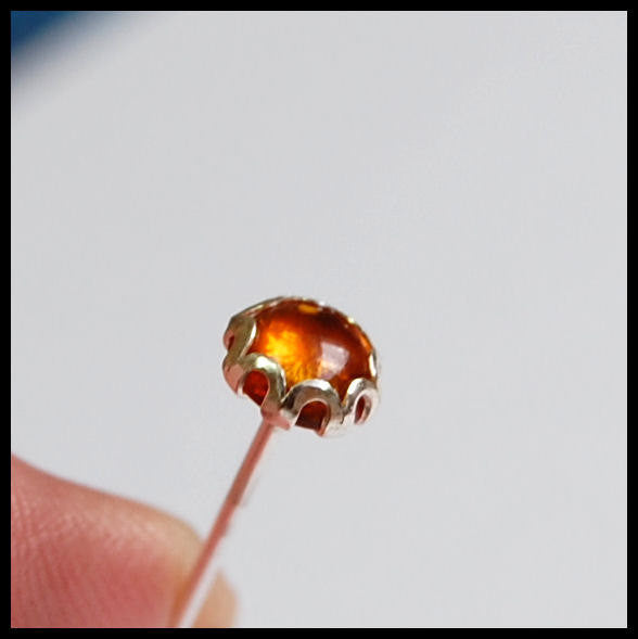 Sterling silver filigree nose stud with amber gemstone