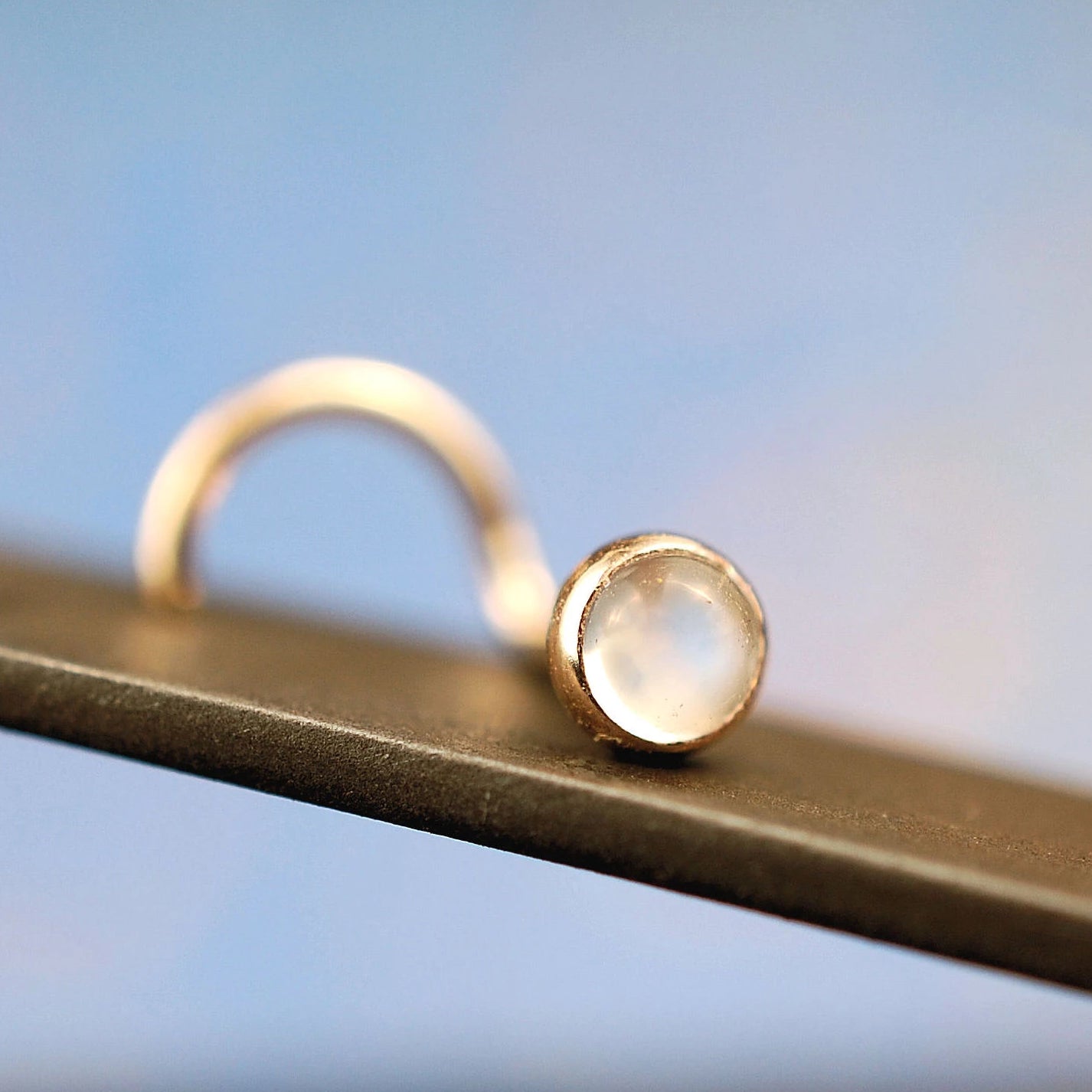 14k yellow gold nose jewelry with rainbow moonstone