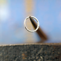 tiny nose hoop in nickel-free sterling silver