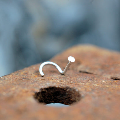 tiny silver flat dot nose stud

