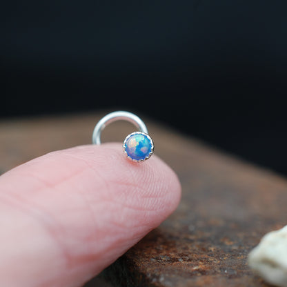 sterling silver nose stud set with blue opal
