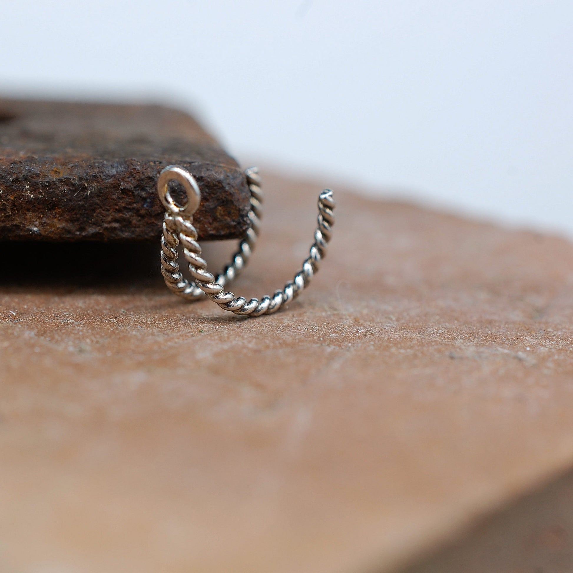 silver twisted enhancer nose ring hoop