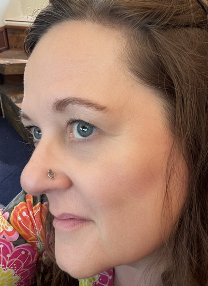 Handcrafted nose, stud in sterling silver created to look like a goddess