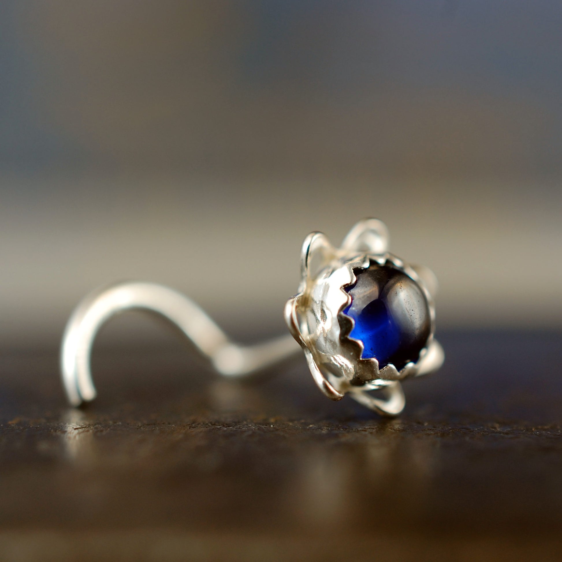 nose stud with sapphire stone handcrafted in sterling silver
