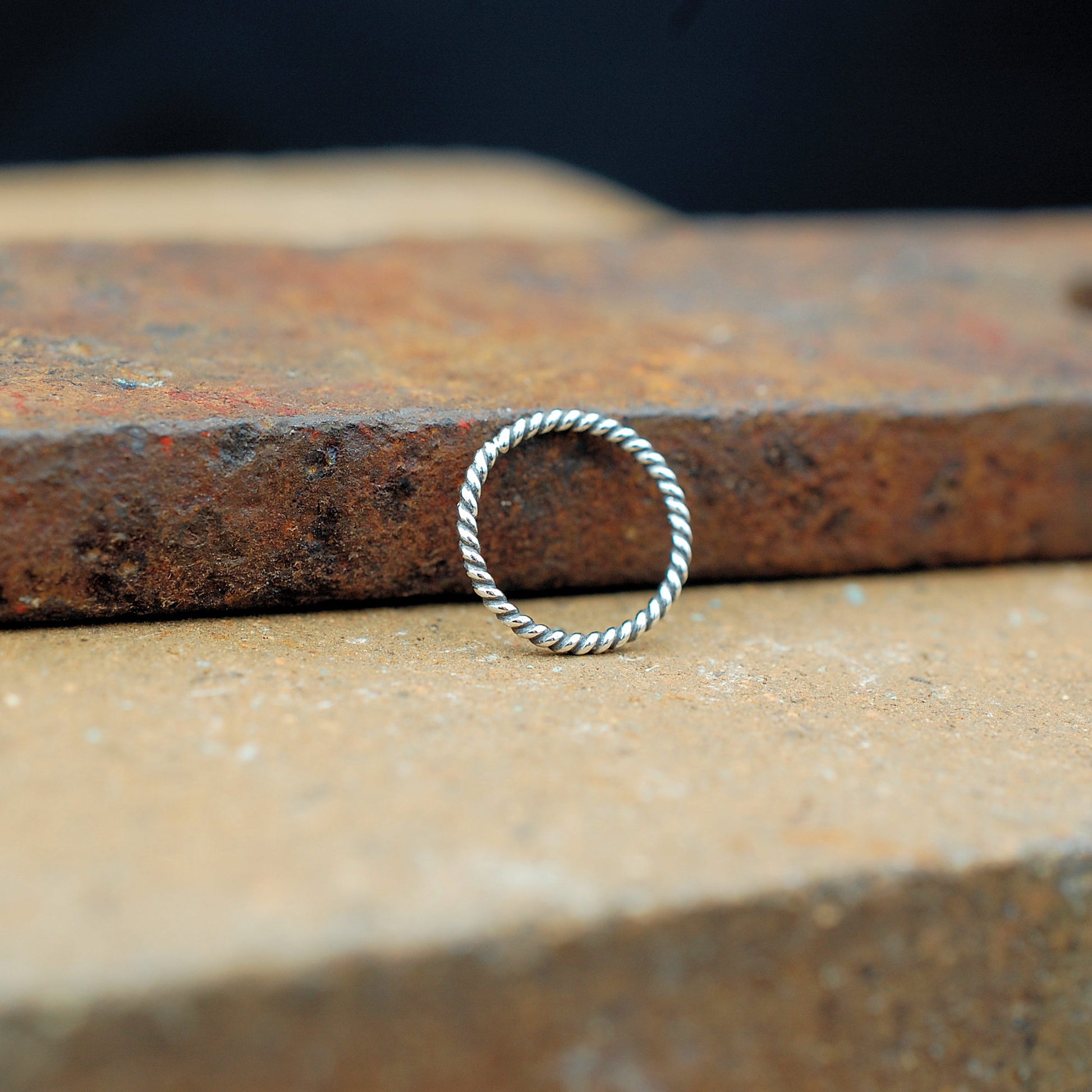minimalist twisted silver nose ring hoop
