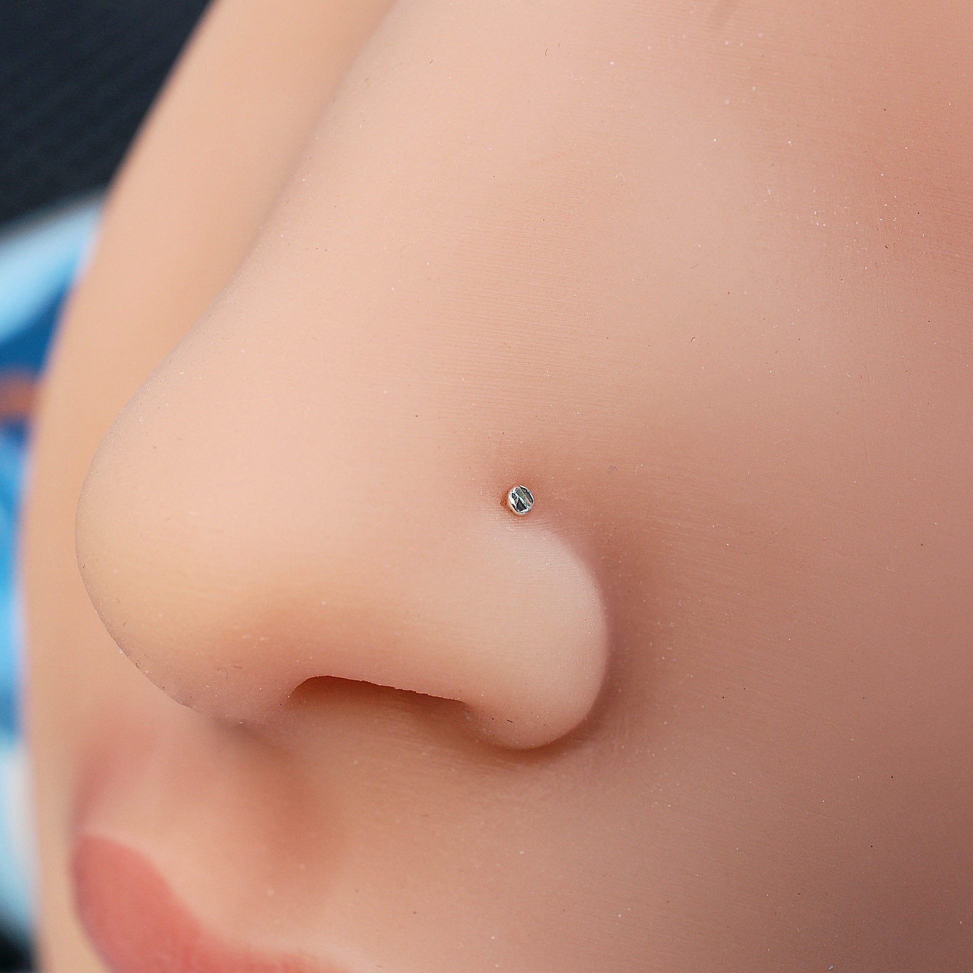 close up of nose with small textured sterling silver handcrafted nose stud