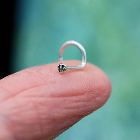 tiny textured sterling silver textured disc nose stud
