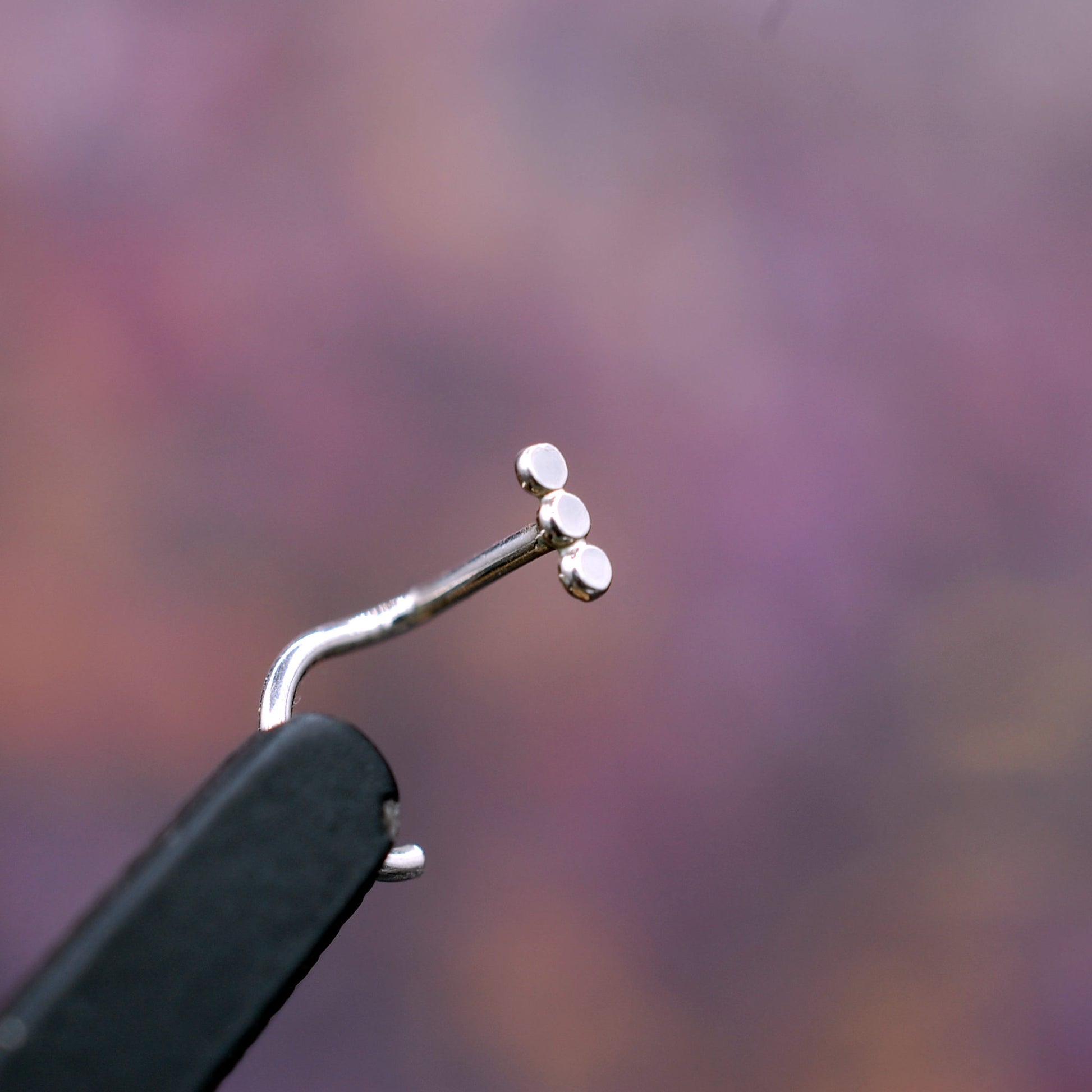 small silver nose ring