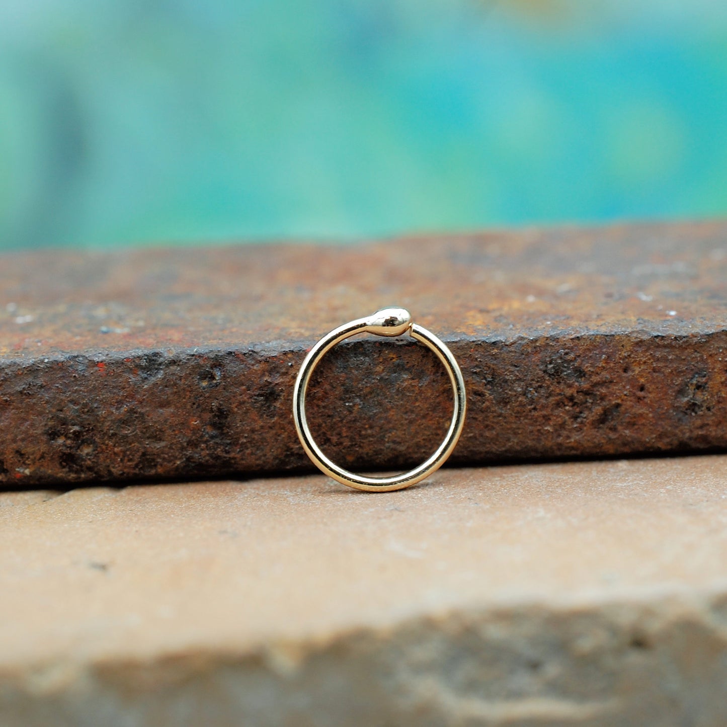 Yellow gold budded nose ring hoop