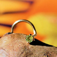 14 karat yellow gold nose stud with peridot