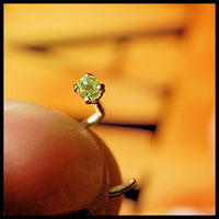 14 karat gold nose stud with peridot gemstone