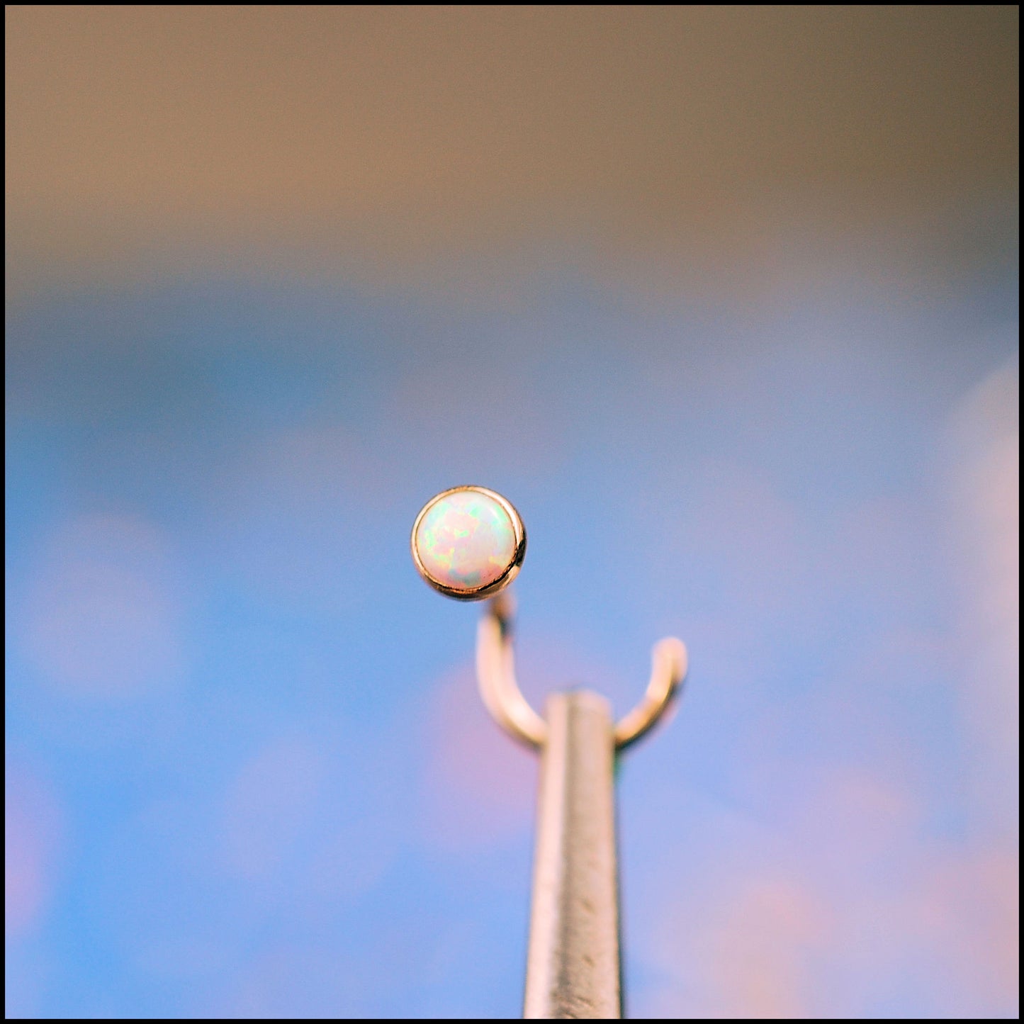 tiny opal nose stud in yellow 14k gold