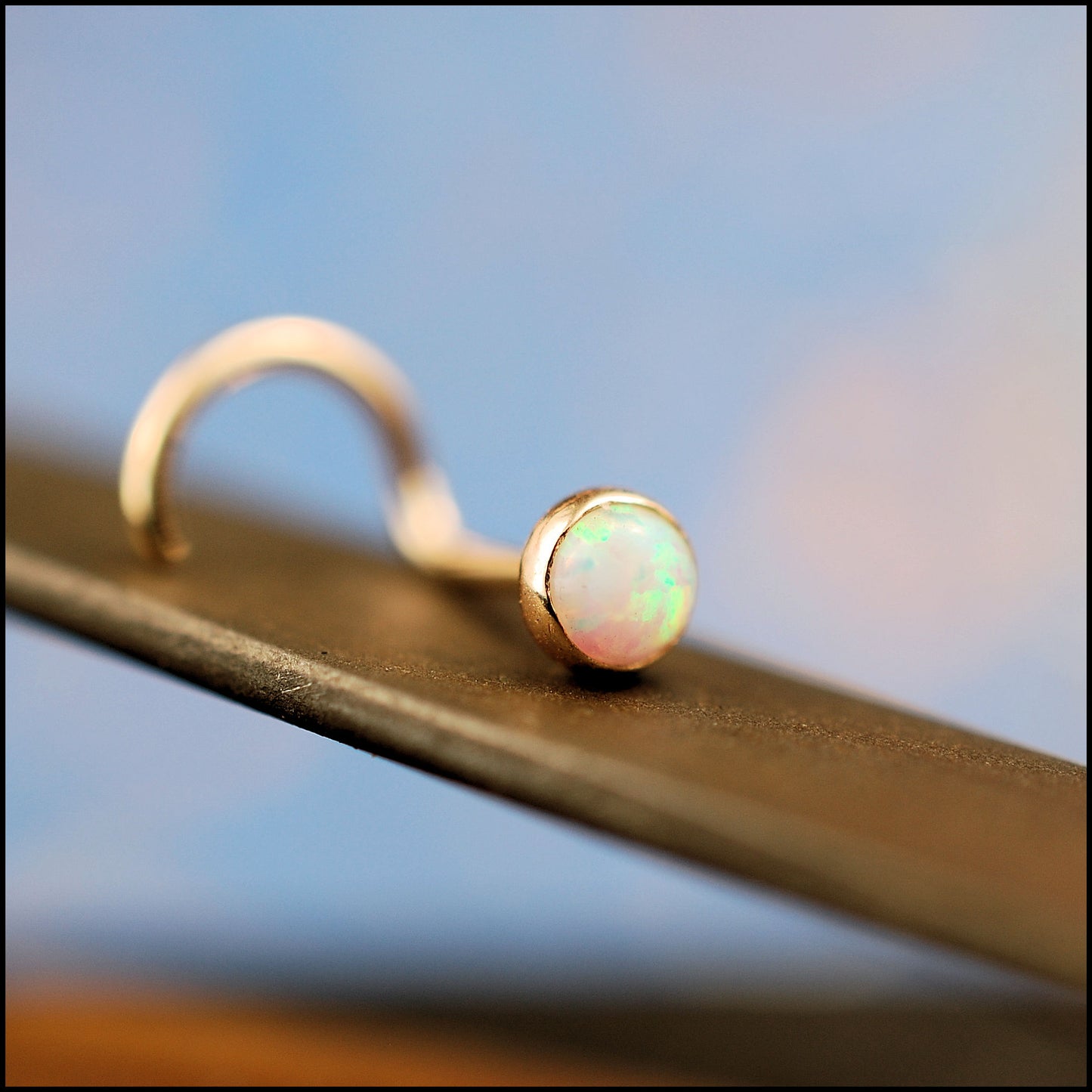 opal gemstone nose stud in 14k yellow gold