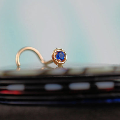dainty sapphire nose jewelry in 14 karat yellow gold