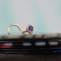 dainty sapphire nose jewelry in 14 karat yellow gold