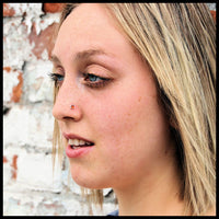 orange nose stud