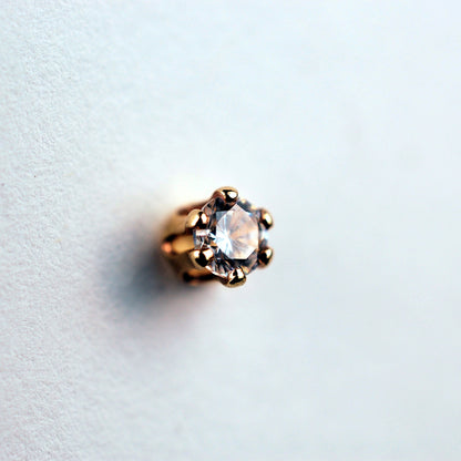 dainty gemstone nose jewelry in yellow gold