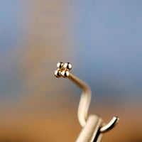 dainty gold flower nose stud