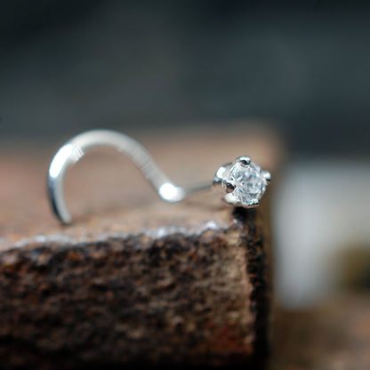 silver and diamond nose bone