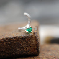 emerald and silver nose stud