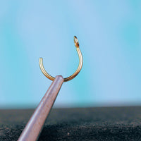 unique 14 karat yellow gold nose ring