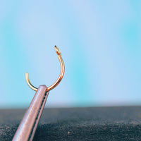 unique 14 karat yellow gold nose hoop