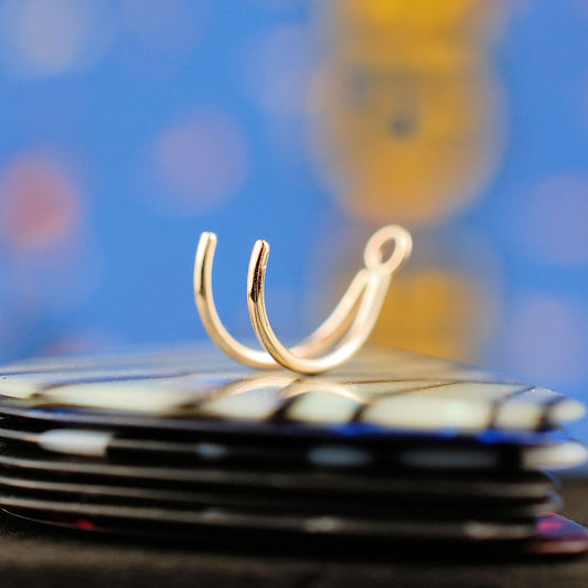 unique 14 karat yellow gold nose ring