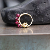 14k yellow gold nose ring with garnet gemstones