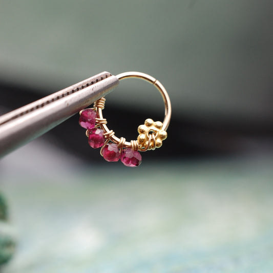 14k yellow gold nose ring with garnet gemstones