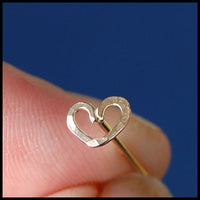 14 karat yellow gold nose stud with tiny heart