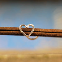 14 karat yellow gold heart nose stud