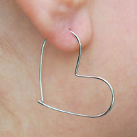 silver heart shaped hoop earrings