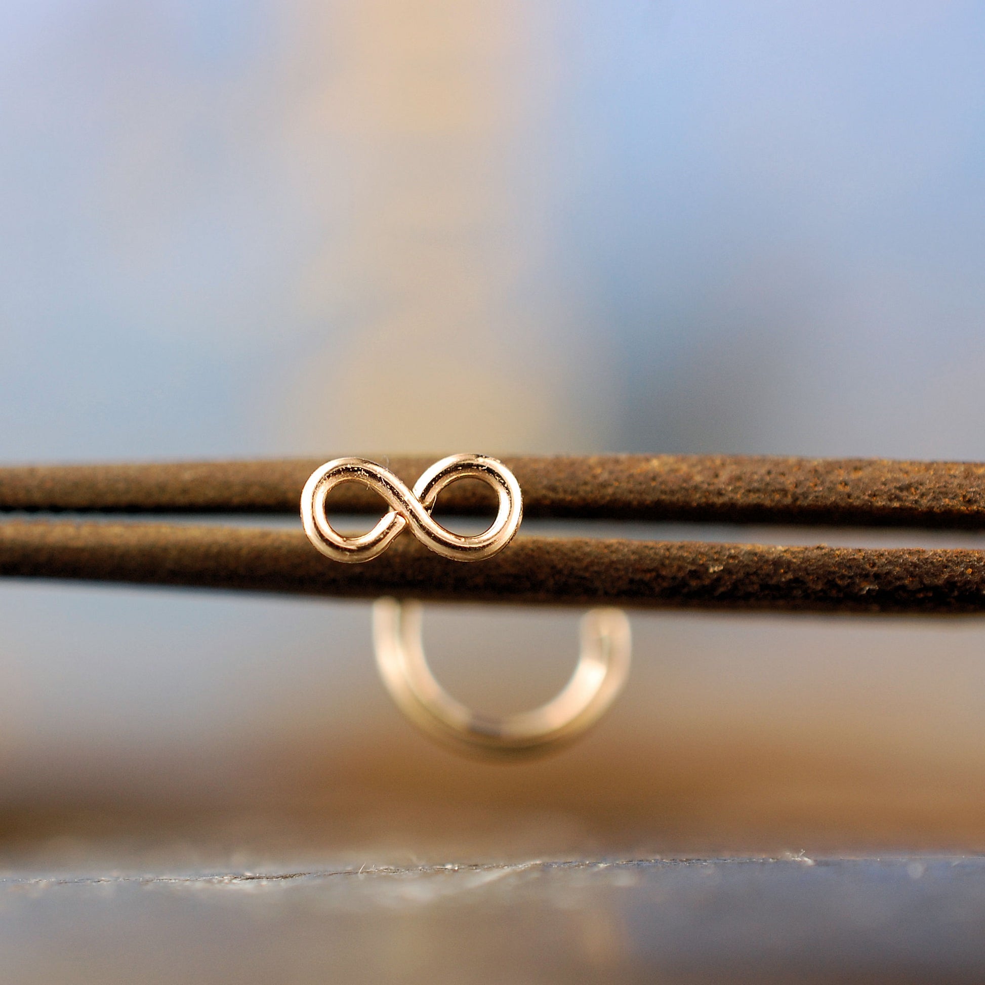 tiny infinity gold nose stud