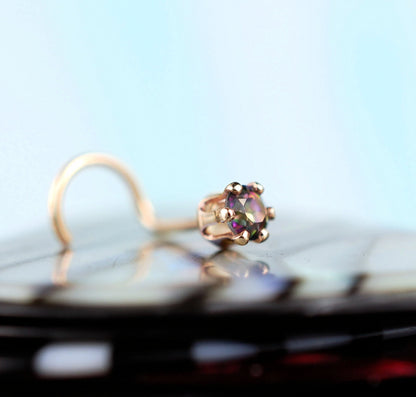 14 karat yellow gold nose jewelry with mystic topaz gemstone