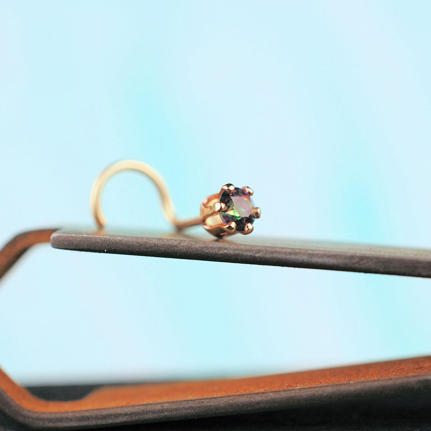 14 karat yellow gold nose stud with mystic topaz gemstone