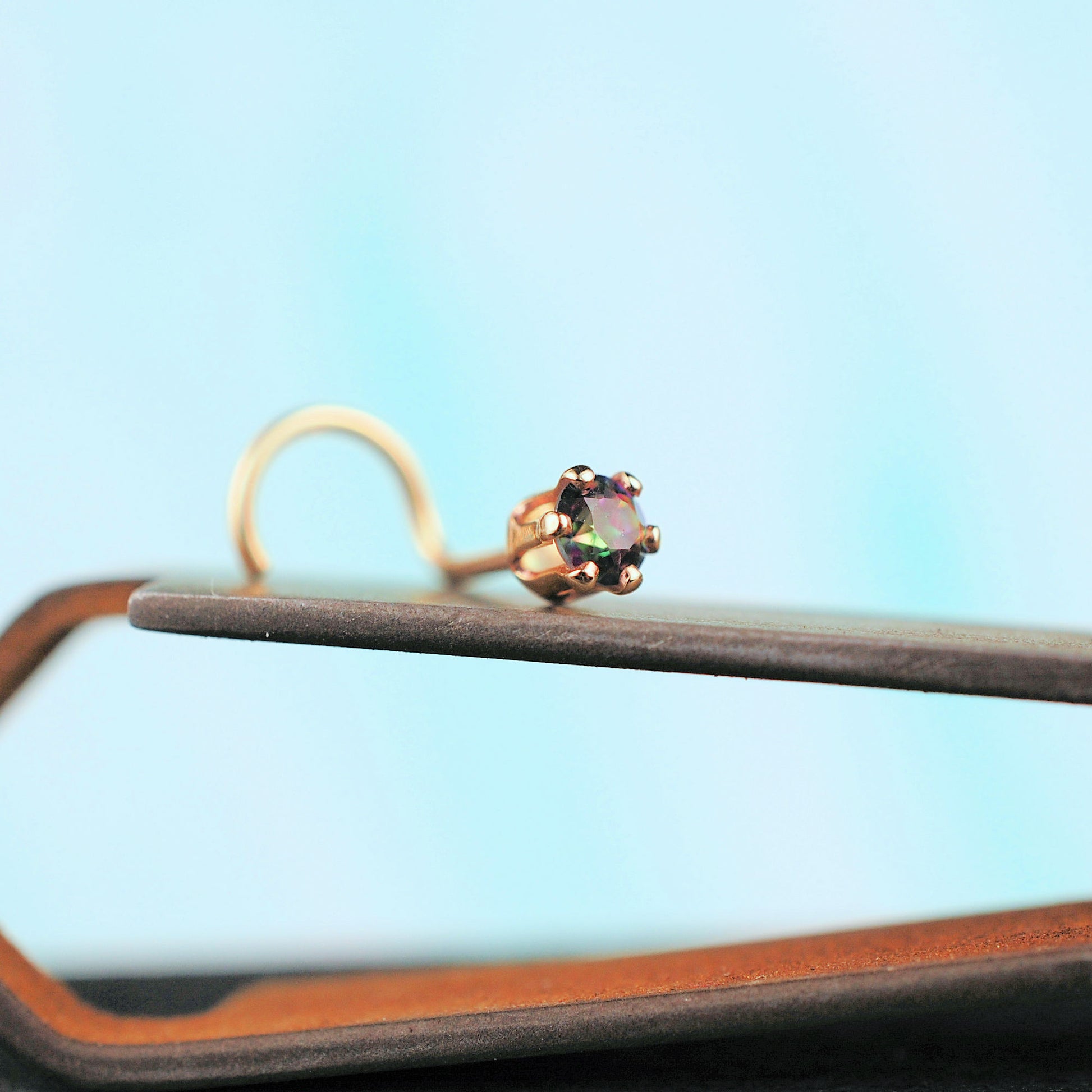 14 karat yellow gold nose stud with mystic topaz gemstone