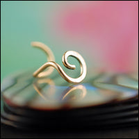 tiny spiral gold nose stud